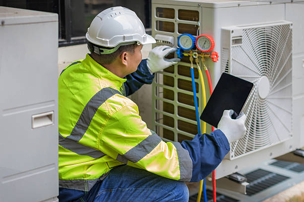 Professional Air Conditioning Repair technician working in Wellington, TX